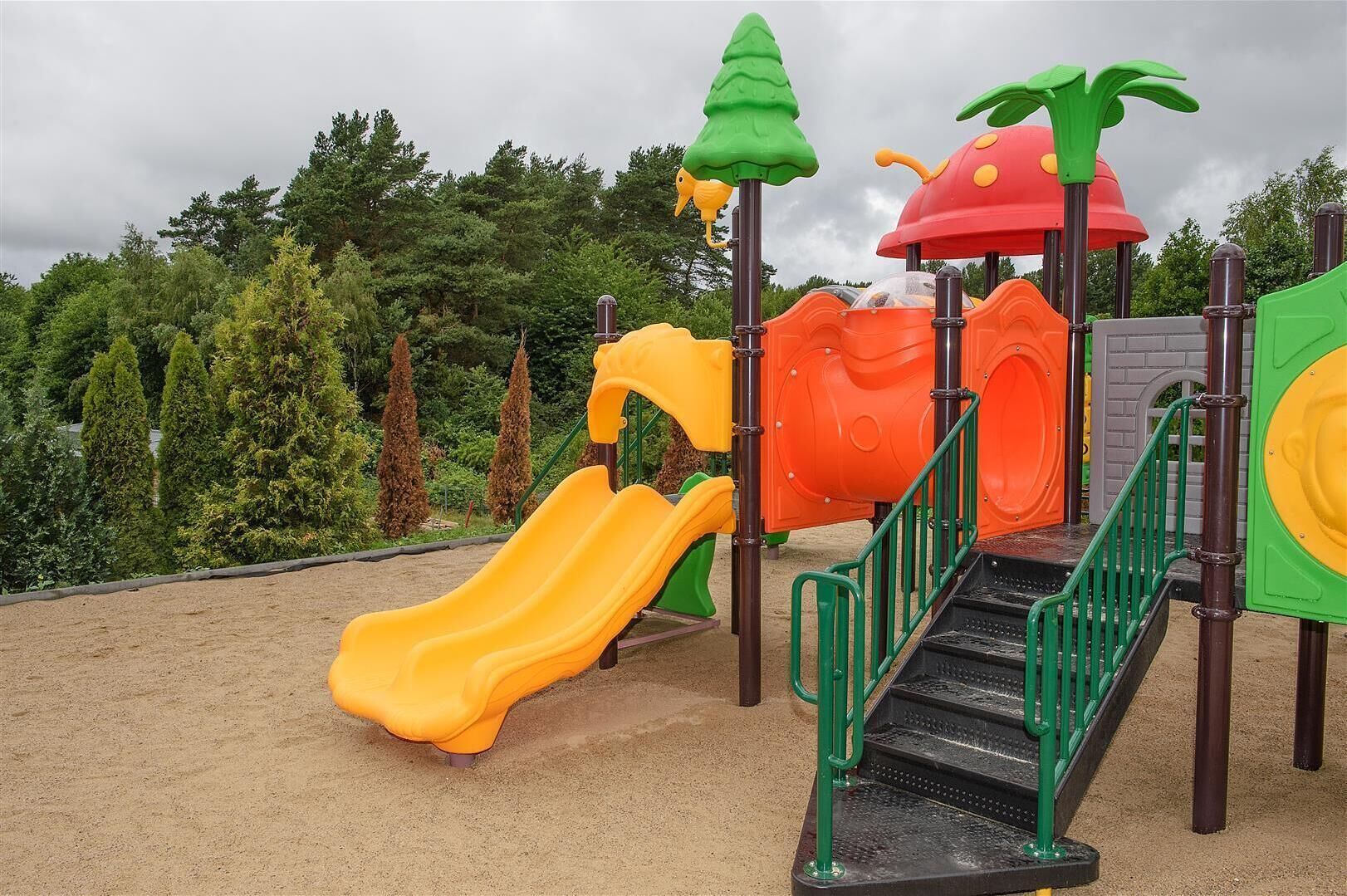 A playground with slides and climbing structures.