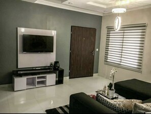 Apartamento, 2 camas Queen | Área de estar