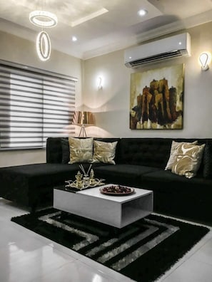 Appartement, 2 grands lits | Salle de séjour