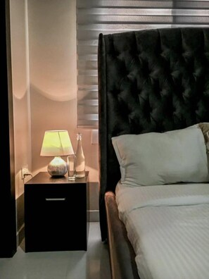 Appartement, 2 grands lits | 2 chambres, fer et planche à repasser, Wi-Fi gratuit, draps fournis