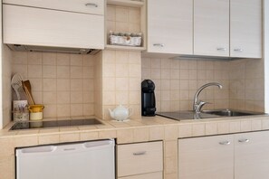 Microwave, stovetop, coffee/tea maker