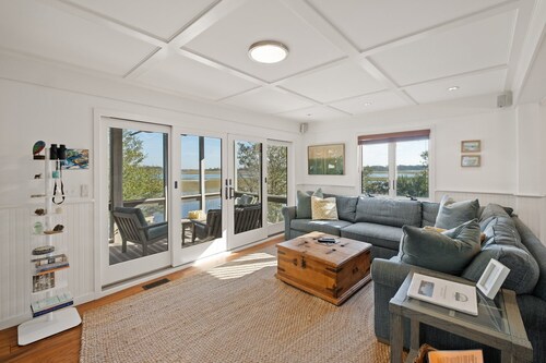 As you enter, the Bald Head Creek and marsh vistas-through the walls of windows-catch your eye.