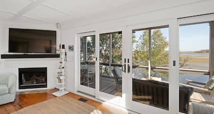 As you enter, the Bald Head Creek and marsh vistas-through the walls of windows-catch your eye.