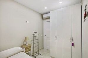 2 dormitorios, tabla de planchar con plancha, wifi gratis y ropa de cama