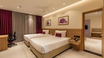Superior Suite | In-room safe, desk, blackout drapes, iron/ironing board (on request)