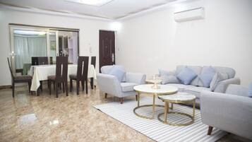 Appartement Familial | Coin séjour | Télévision à écran plat
