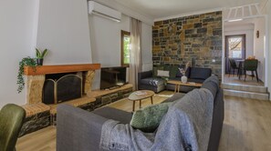 Casa Premium | Área de sala de estar | Televisión 