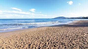 On the beach, white sand