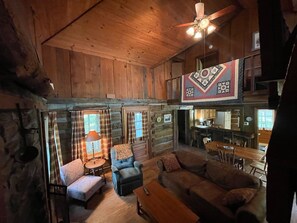 TV, fireplace - Cabins In The Pines Unit 3-Motorcycle Friendly-Wood Fireplace - Covered Porch (Cherokee)