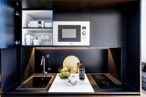 Fridge, microwave, stovetop, coffee/tea maker