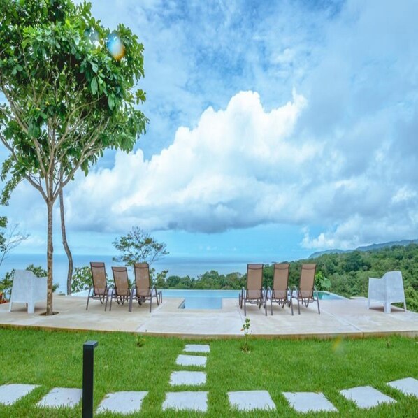 Outdoor pool, pool umbrellas, pool loungers