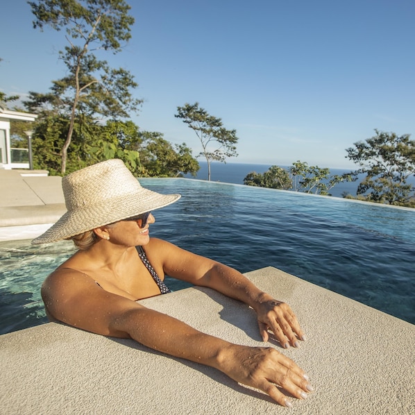 Outdoor pool, pool umbrellas, sun loungers
