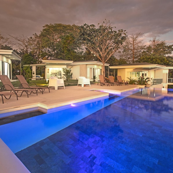 Outdoor pool, pool umbrellas, sun loungers