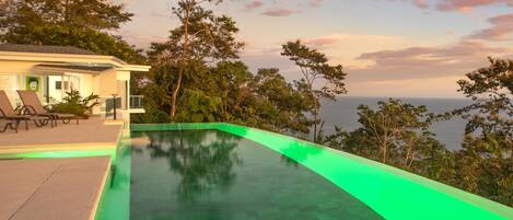 Outdoor pool, pool umbrellas, pool loungers