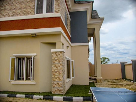 Exterior. UPGATES ENTERPRISE -HOMES & SUITES