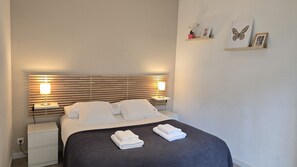 2 dormitorios, tabla de planchar con plancha, cuna de viaje y wifi