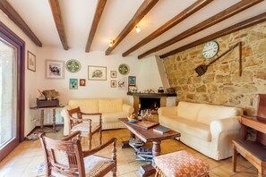 Family Villa, Multiple Bedrooms, Mountainside (Villa Olmo With Private Pool) | Living area | 21-inch flat-screen TV with cable channels, fireplace - Villa Olmo With Private Pool (Castel di Lucio)