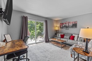 TV - Luxurious 2-Bedroom Abode with Elevated Comforts Near Main Street (Saint Charles)