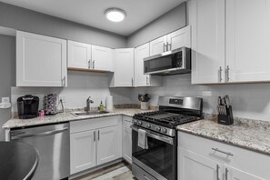 Fridge, microwave, oven, stovetop - Luxurious 2-Bedroom Abode with Elevated Comforts Near Main Street (Saint Charles)