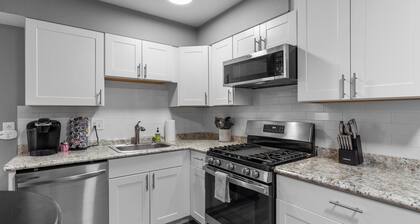 Luxurious 2-Bedroom Abode with Elevated Comforts Near Main Street