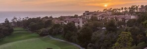A coastal resort with multiple villas, a golf course, and a view of the ocean at sunset. - Marriott's Newport Coast Villas 2 Bedroom 2 Bath (Newport Beach)