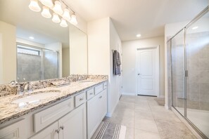 Combined shower/tub, hair dryer, towels, soap