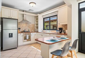 Panoramic Luxury and fully equipped Kitchen of the 3BR house in Noord Aruba - Availability of all kitchen accessories - Ample amount of storage - Beautiful lighting scheme - Beautiful 2 high chairs available - Elegant decor