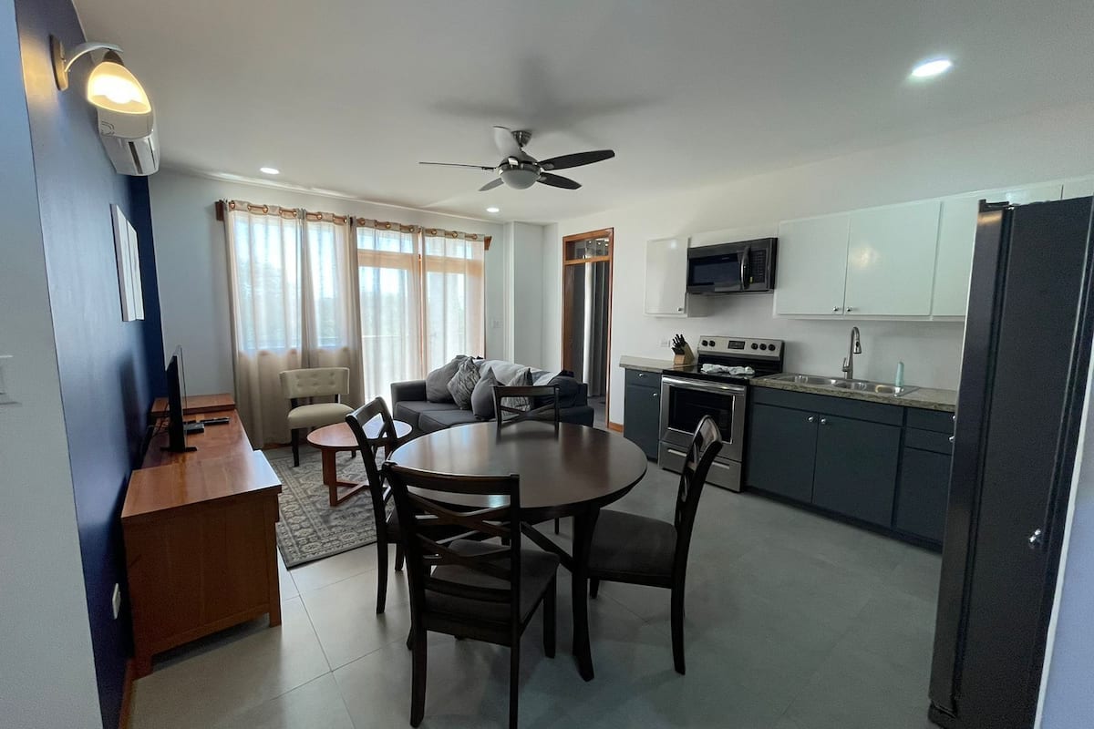 Suite, 2 Queen Beds, Balcony, Garden View | In-room dining