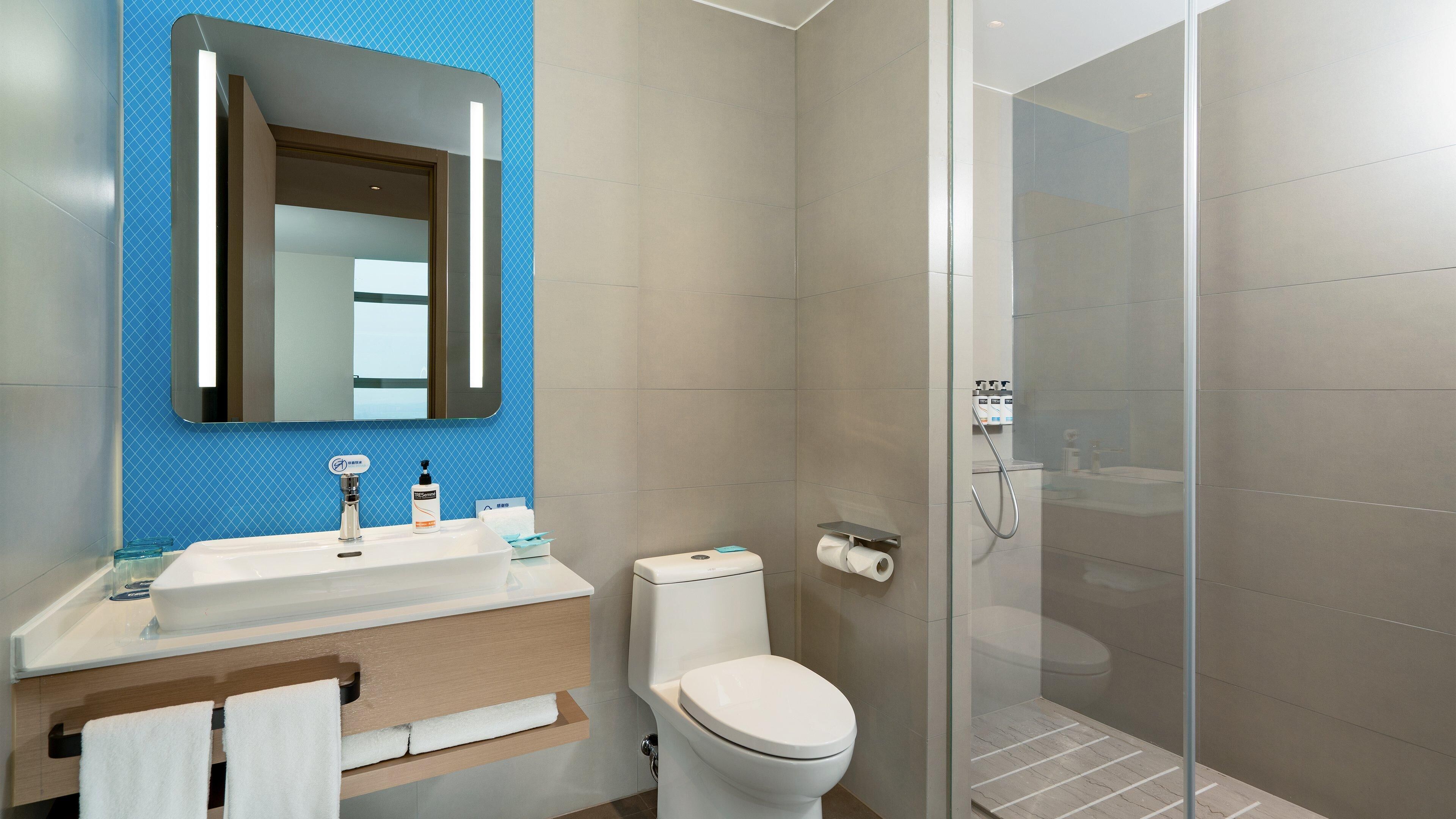 Bathroom | Shower, free toiletries, hair dryer, towels