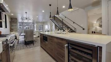 Townhome | Private kitchen | Full-size fridge, microwave, oven, dishwasher