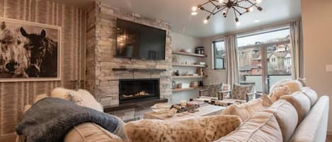 Townhome | Living area | 40-inch flat-screen TV with cable channels, TV, fireplace