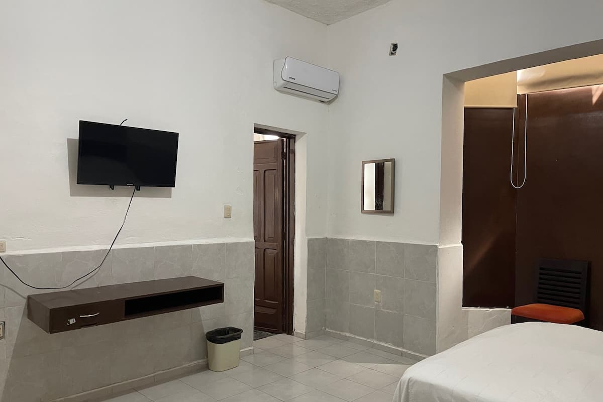 Standard Quadruple Room, 2 Double Beds, Ensuite, Ground Floor | Down comforters, blackout drapes, WiFi (free), bed sheets