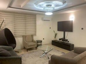 House | Living area | Fireplace - Beautiful Short-let Apartment in Lekki Phase 1 (Lekki)