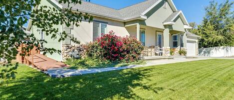 Side yard with flowering bushes