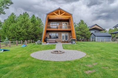 Lakefront 4BR/4BA Cabin with Sauna, Hot Tub & Private Dock – Minutes from YNP!