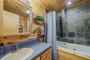 Combined shower/tub, jetted tub, hair dryer, towels