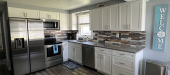 COVE DISTRICT HOUSE WITH VIEW OF CEDAR POINT