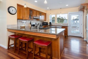 Townhome, Multiple Beds (Lakeside Haven) | Private kitchen | Dining tables - Lakeside Haven (Rockaway Beach)