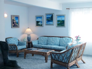 Casa, varias camas (Ocean Rose) | Sala de estar