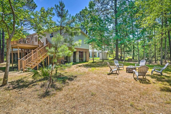 A house with a wooden deck and outdoor seating area. - Mt Pleasant Retreat w/ Grill: 10 Mi to Beach (Mt Pleasant)