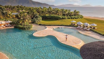 2 outdoor pools, pool umbrellas, pool loungers