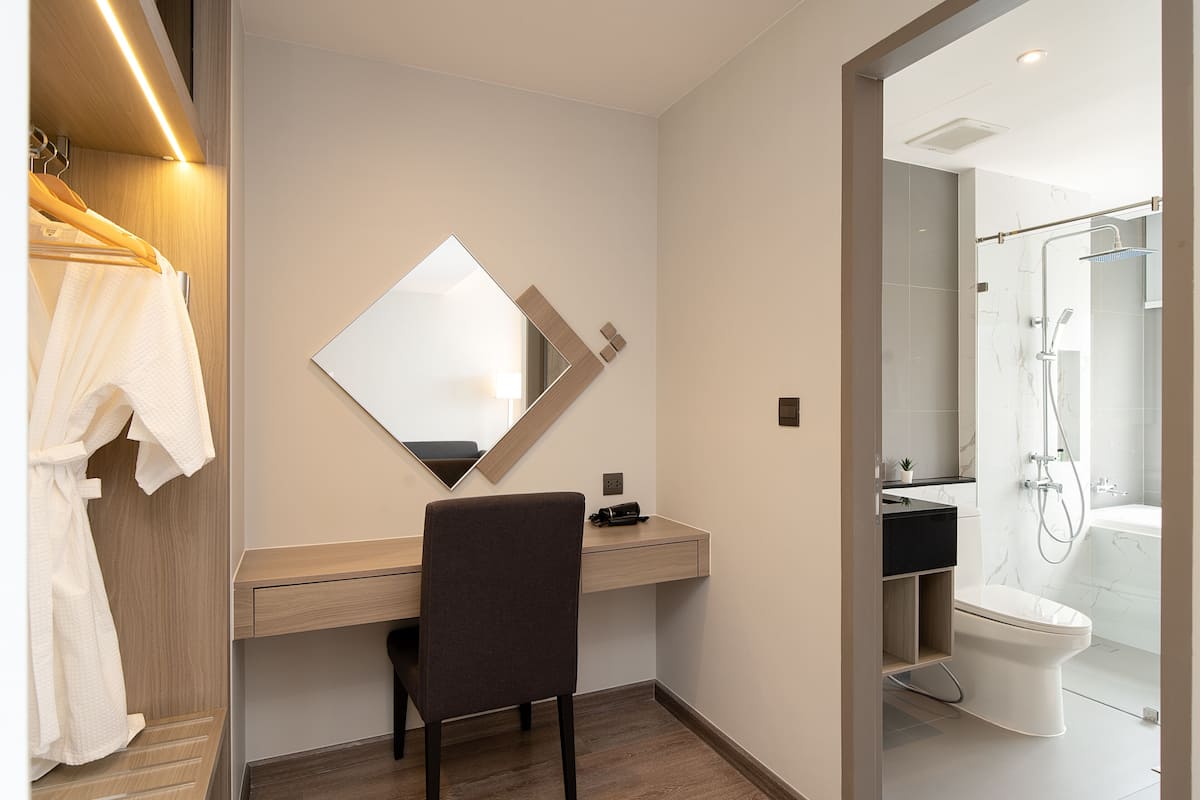 Deluxe Double Room | In-room safe, desk, blackout curtains, iron/ironing board