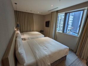 Family Quadruple Room | Down comforters, in-room safe, desk, laptop workspace - N hotel (Taipei)