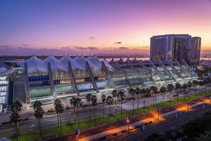 A modern building with a unique architectural design, featuring a series of triangular structures and a large glass facade. - Hard Rock Hotel SAN Diego (SAN DIEGO)