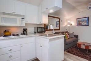 Fridge, microwave, stovetop, coffee/tea maker