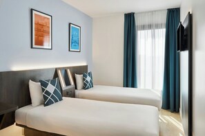 Habitación estándar, 2 camas individuales | Edredón, espacio para trabajar con laptop y insonorización
