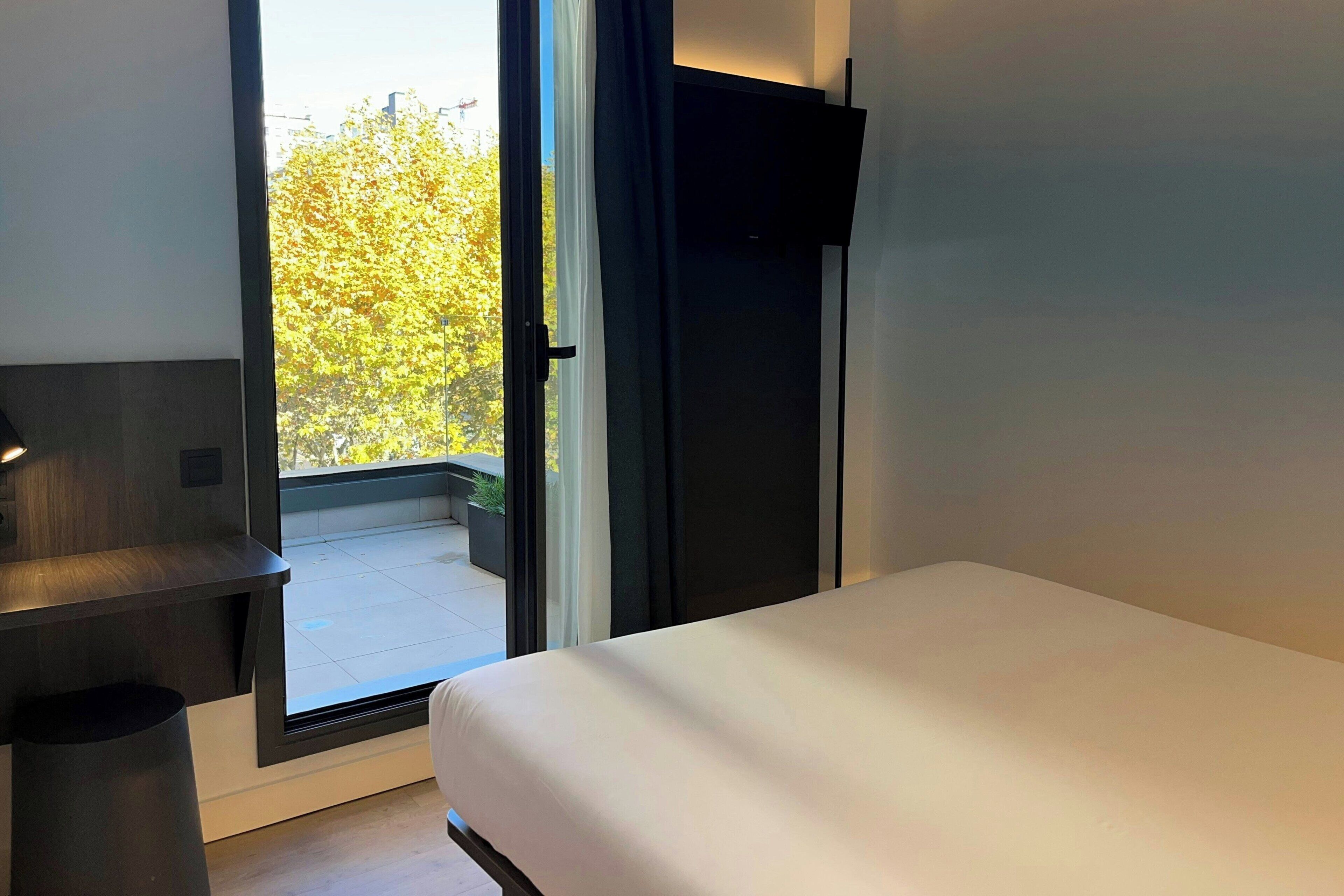 Standard Room, 1 Queen Bed, Terrace, City View | Down comforters, laptop workspace, soundproofing, iron/ironing board