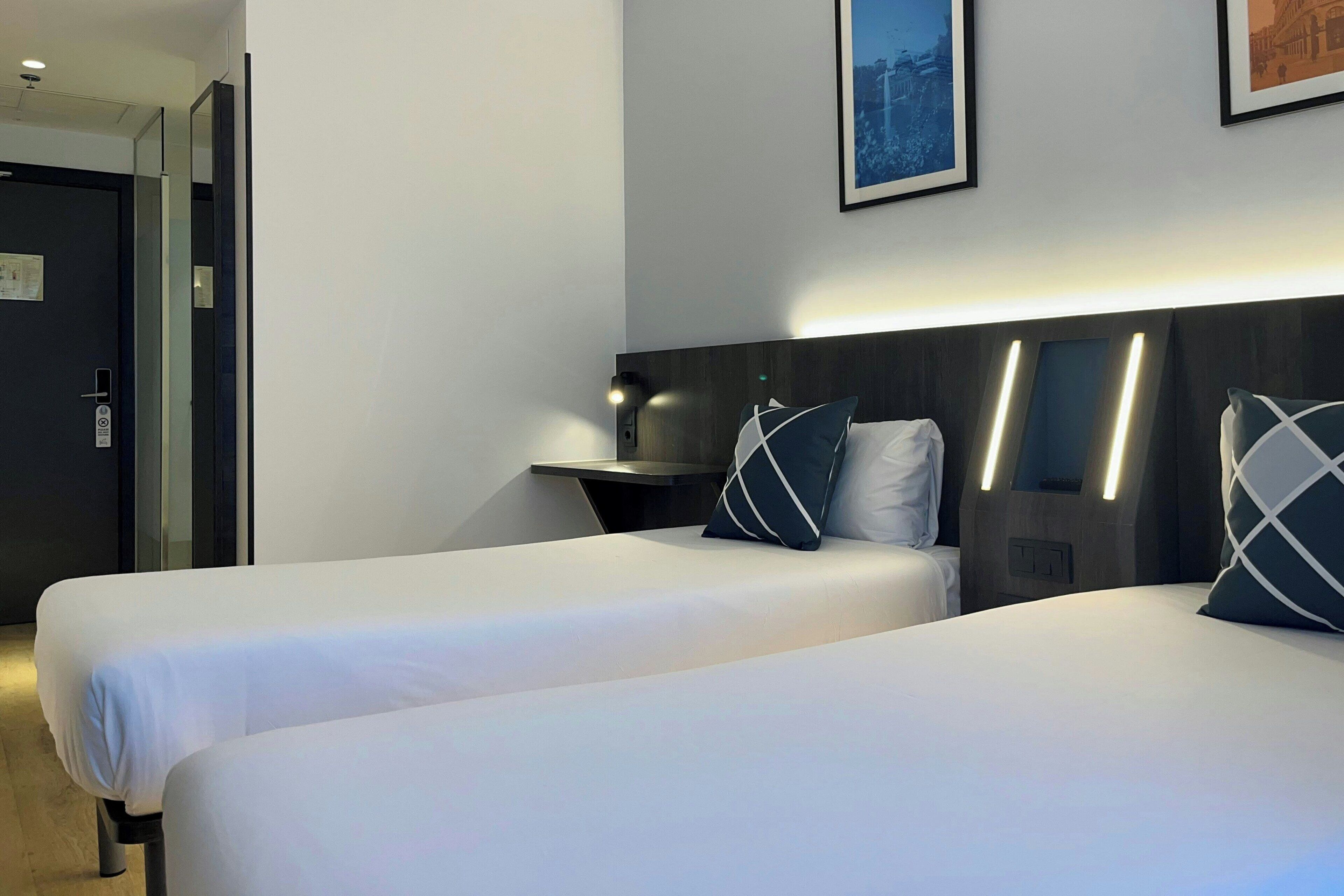 Standard Room, 2 Twin Beds | Down comforters, laptop workspace, soundproofing, iron/ironing board