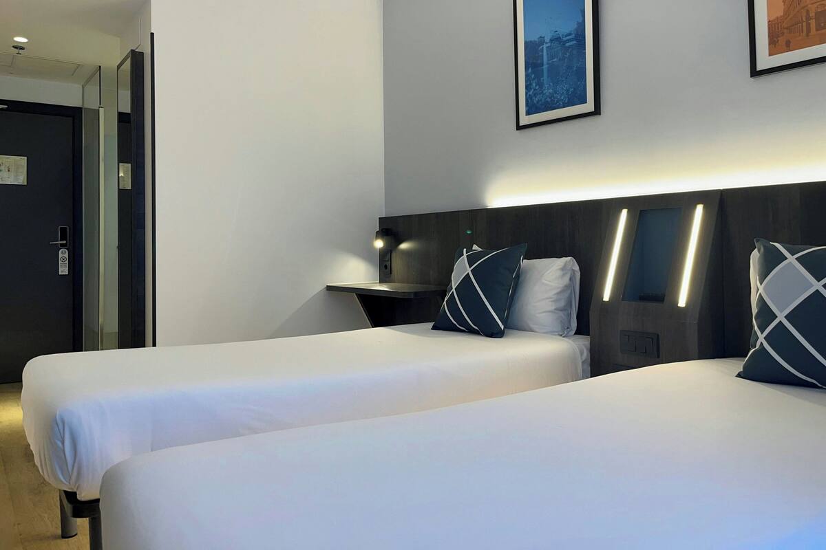 Standard Room, 2 Twin Beds | Down comforters, laptop workspace, soundproofing