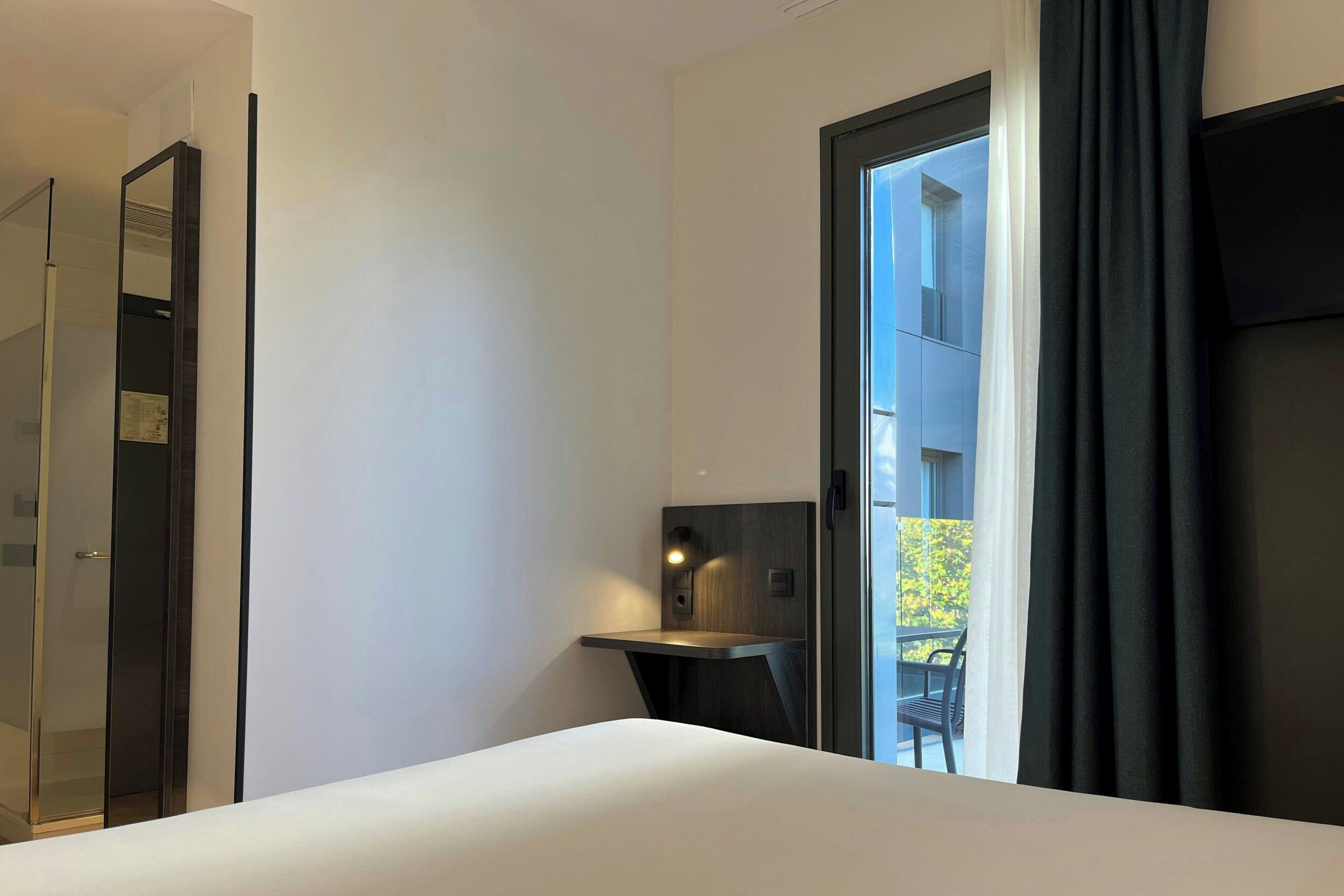 Standard Room, 1 Queen Bed, Terrace, City View | Down duvets, laptop workspace, soundproofing, iron/ironing board